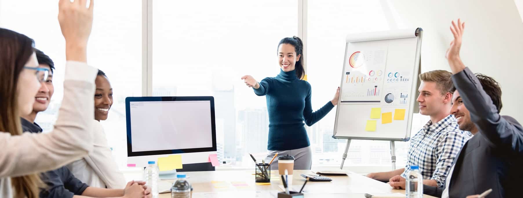 Young Asian businesswoman leader asking for opinion in the meeting Young casual Asian businesswoman leader asking for opinion in the meeting while making a presentation, panoramic banner background