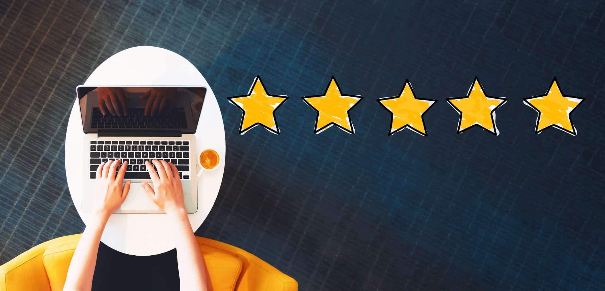 Five Star Rating with person using a laptop Five Star Rating with person using a laptop on a white table